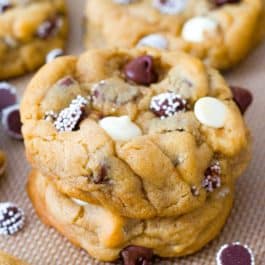 stack of triple chocolate chip cookies on a silpat baking mat