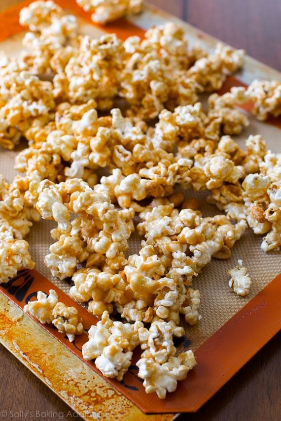 peanut butter caramel corn on a silpat baking mat