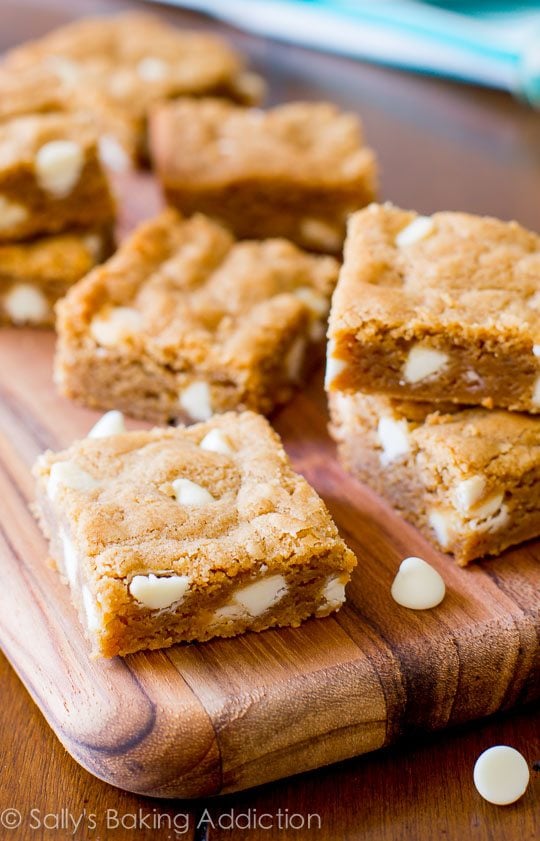 biscoff white chocolate blondies on a wood board