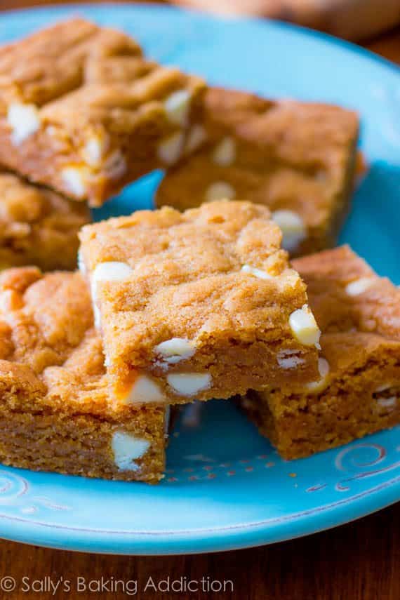 biscoff white chocolate blondies on a blue plate