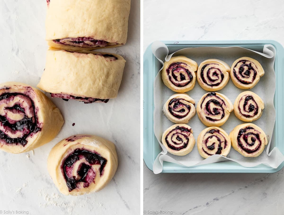 blueberry filled cinnamon rolls before baking set in blue square pan.