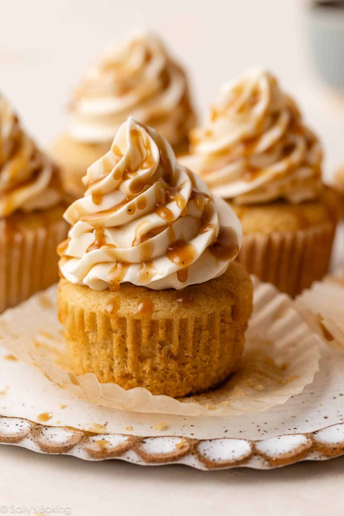 brown sugar cupcake with butterscotch sauce and vanilla buttercream on top.