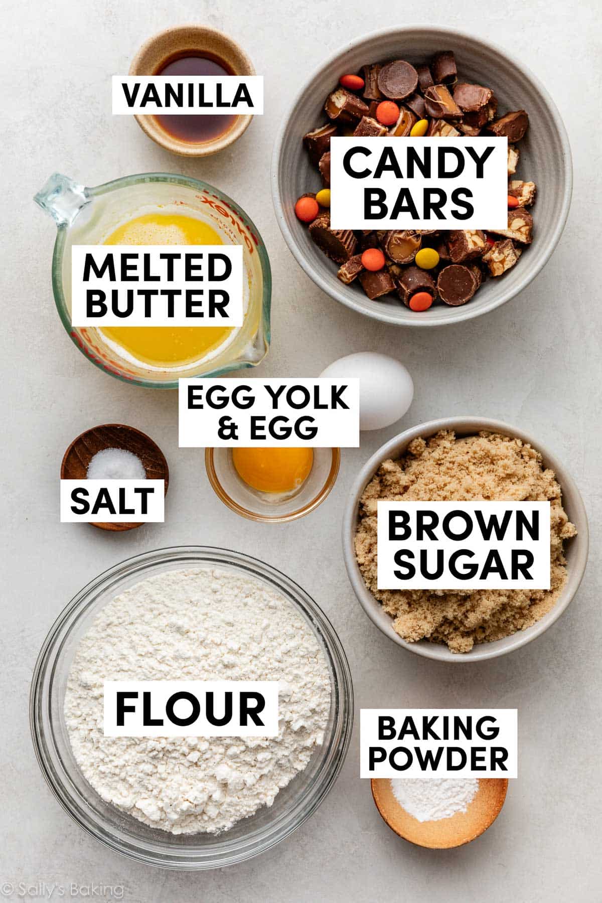ingredients measured in bowls including brown sugar, melted butter, and flour.