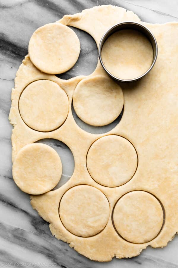 pie dough rolled out and cut into small circles.