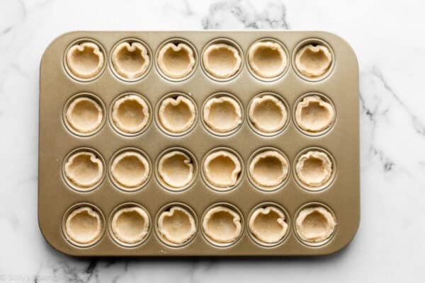 mini muffin pie crusts in mini muffin pan.