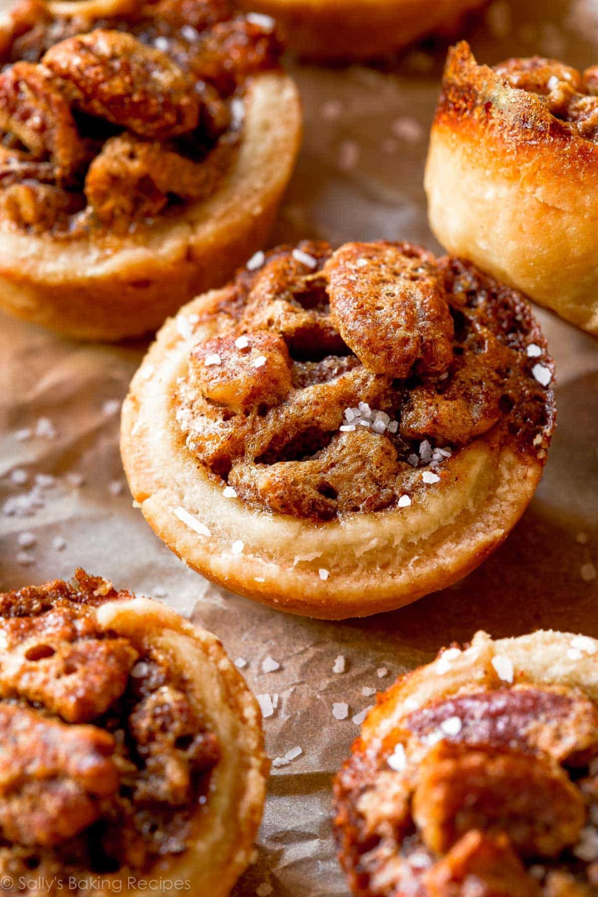 close-up of mini pecan pie with sea salt on top.