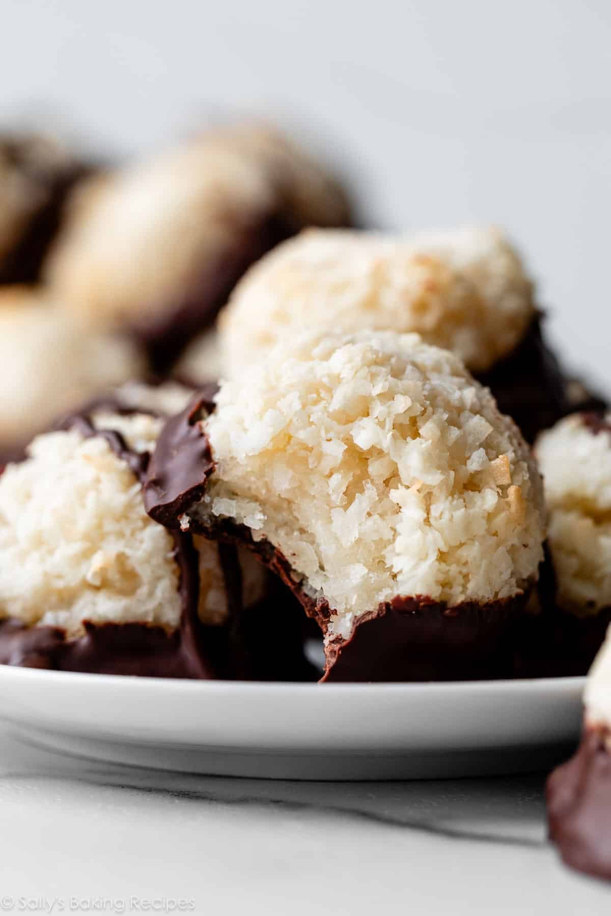 coconut macaroon with bite taken out.