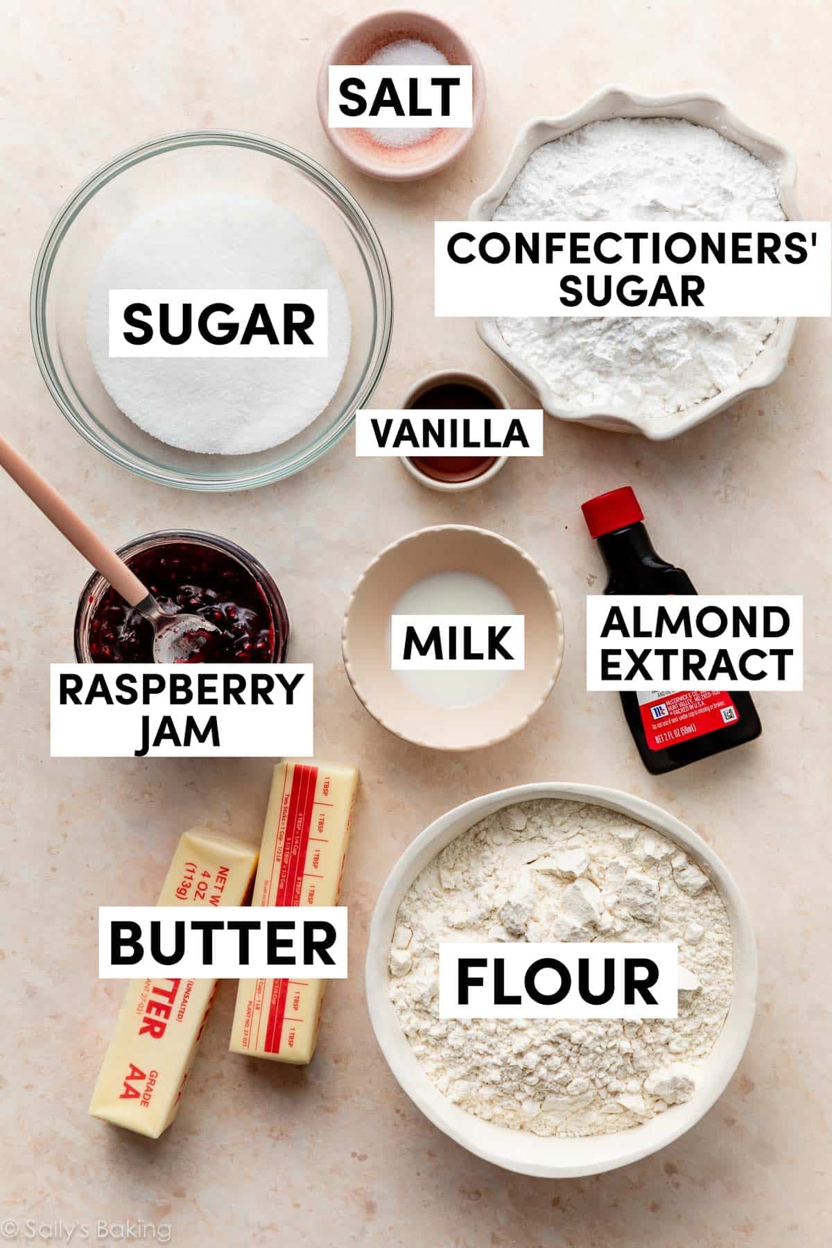 ingredients in bowls including flour, confectioners' sugar, salt, and milk.