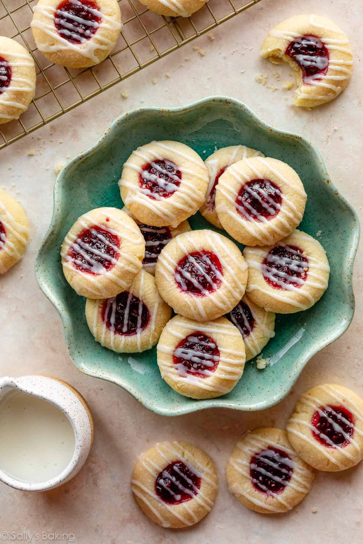 raspberry almond thumbprints on blue plate.