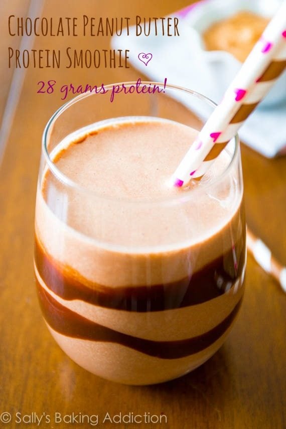 chocolate peanut butter smoothie in a glass with straws