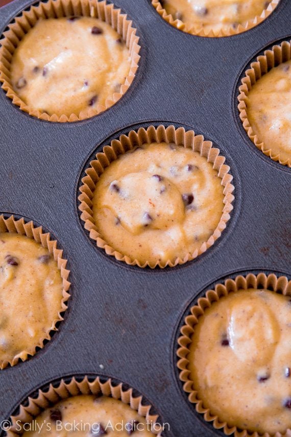 banana chocolate chip cupcake batter in a cupcake pan before baking