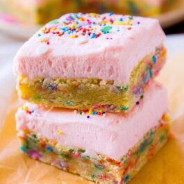 stack of frosted sugar cookie bars