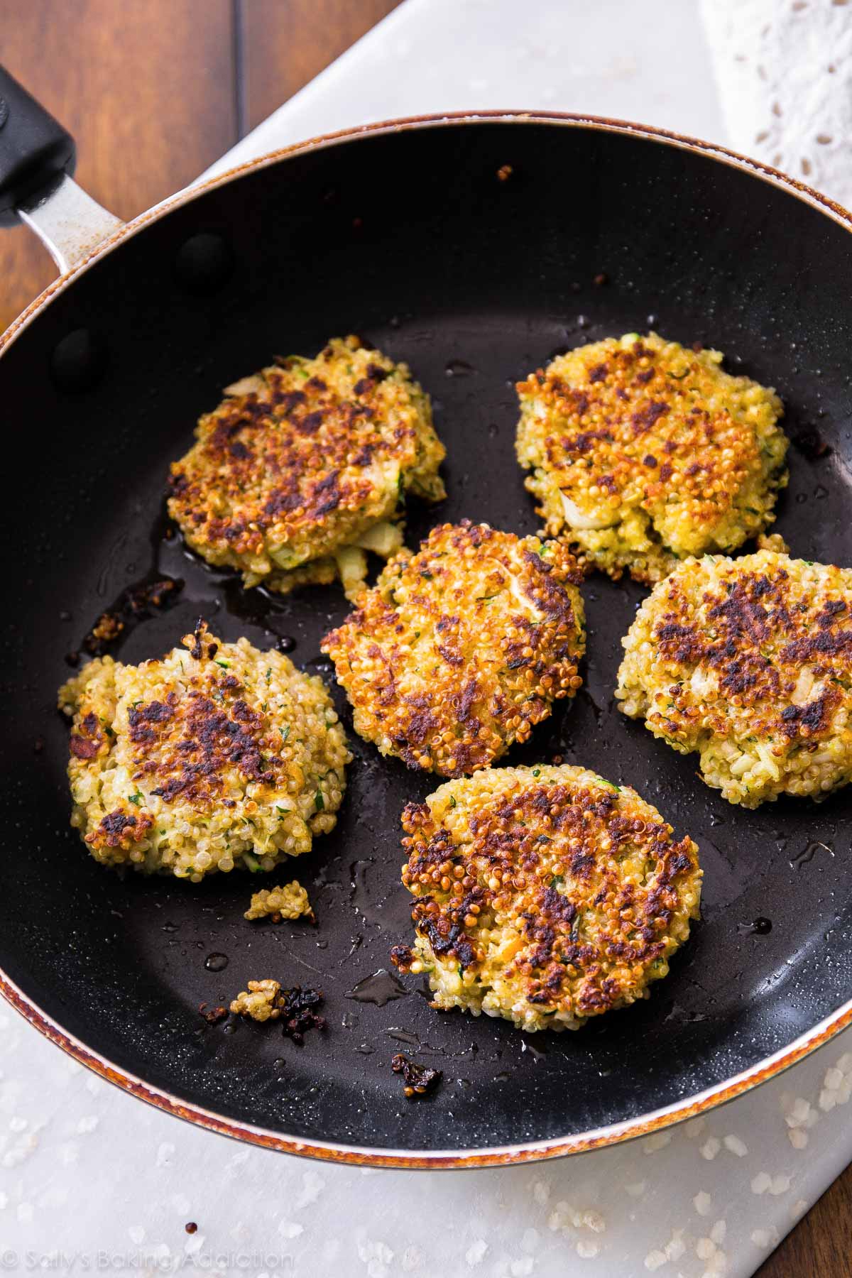 quinoa patties in a skillet