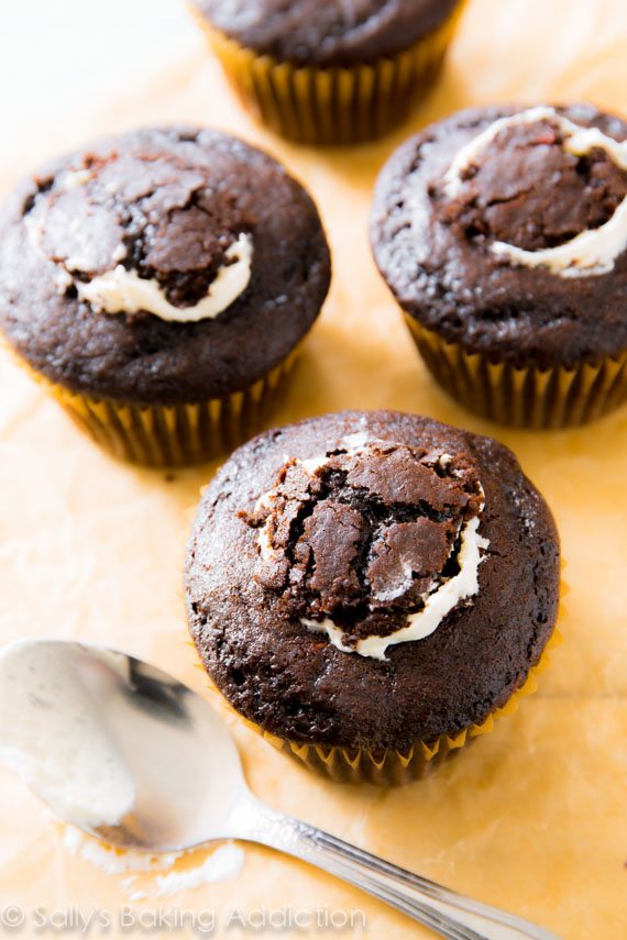 chocolate cupcakes with marshmallow filling and the cupcake tops placed back on top