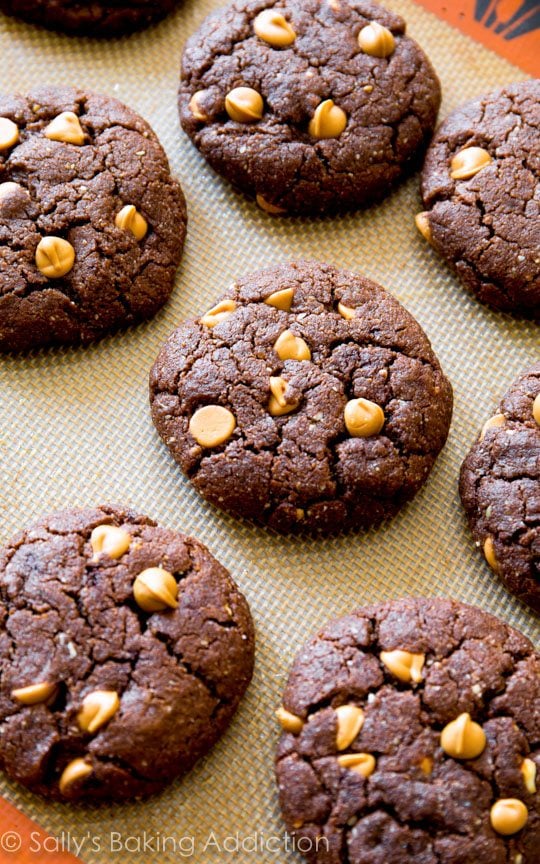 flourless peanut butter brownie cookies on a silpat baking mat