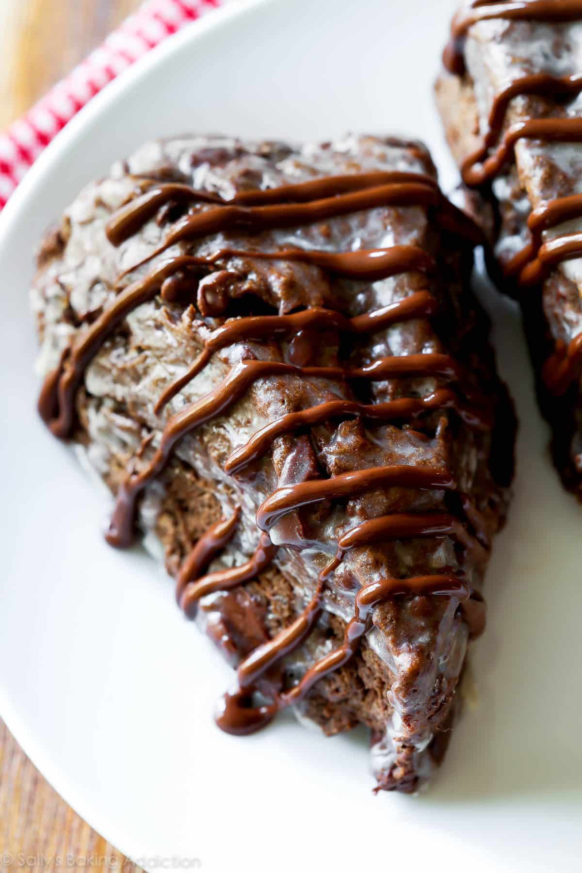 Chocolate scone on white plate