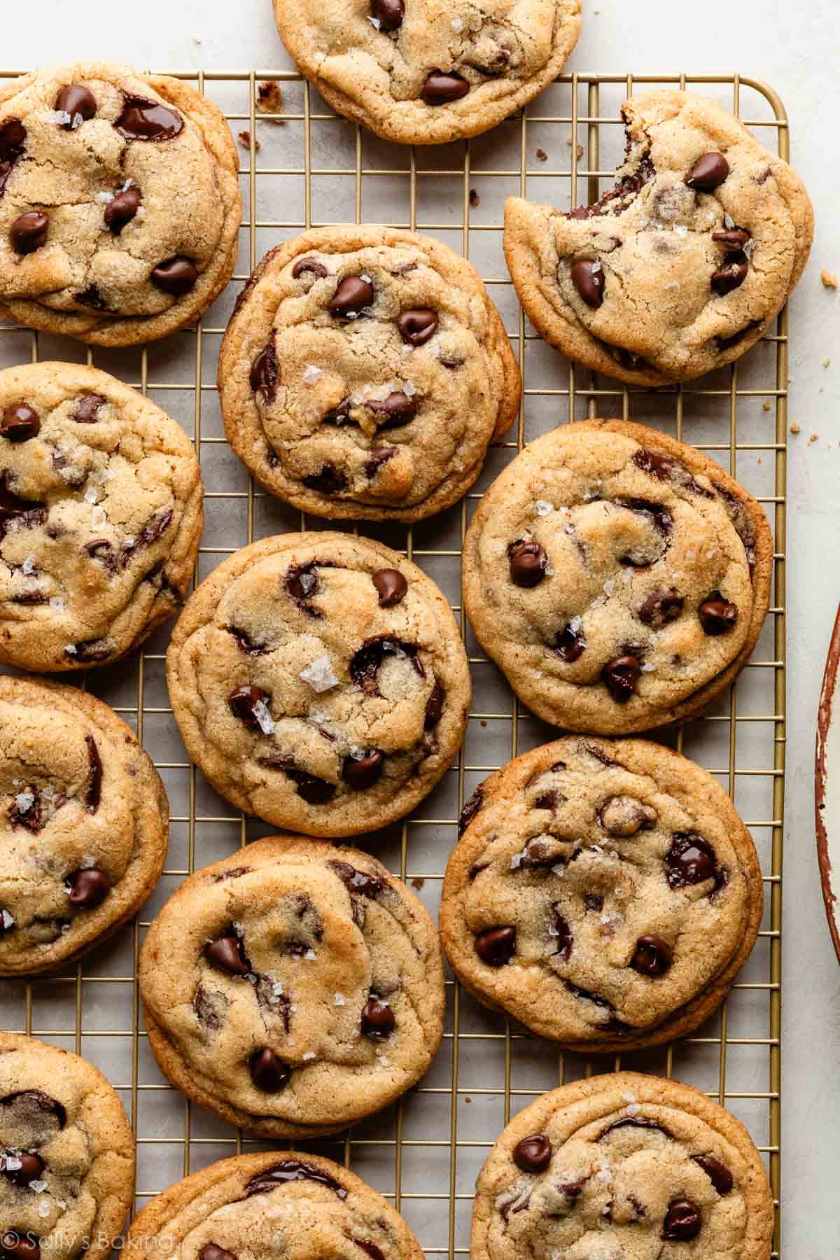 brown butter chocolate chip cookies on gold cooling rack.