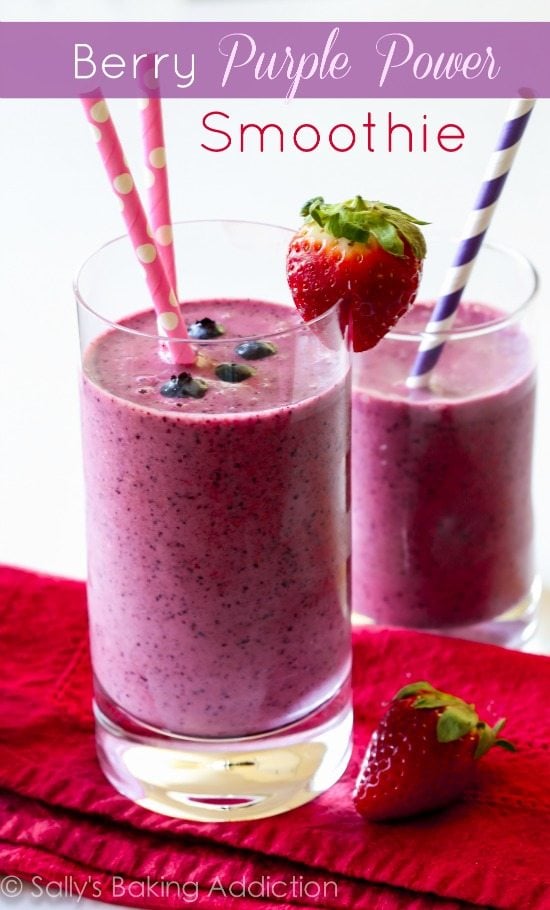 berry smoothies in glasses with straws