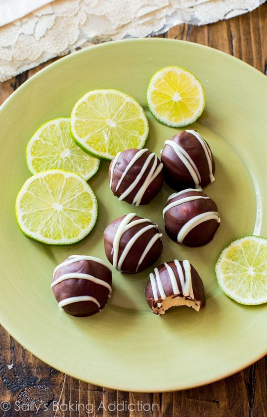 dark chocolate key lime pie truffles on a green serving platter