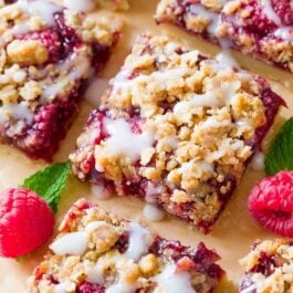 raspberry streusel bars with vanilla icing