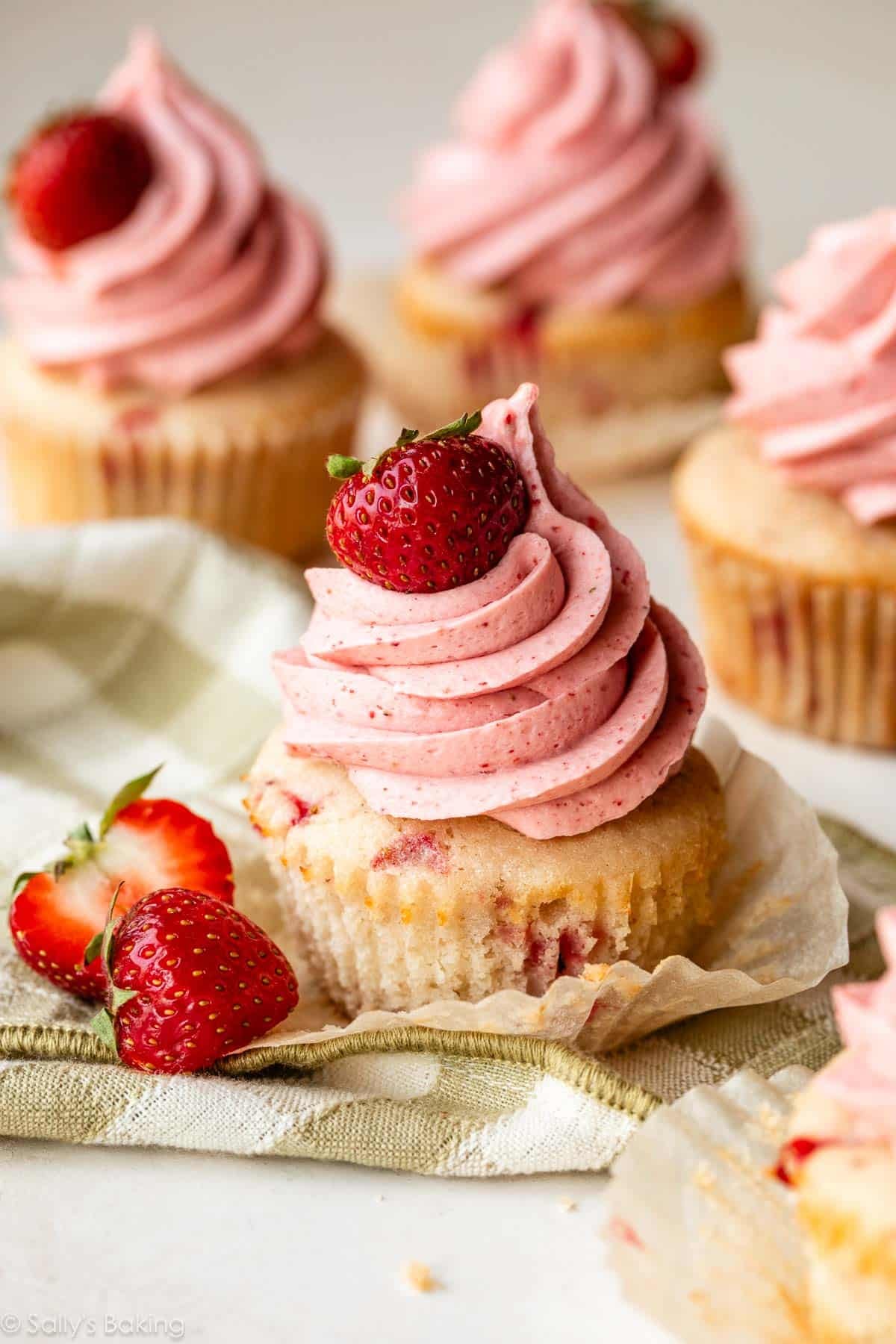 strawberry cupcake with piped strawberry buttercream.