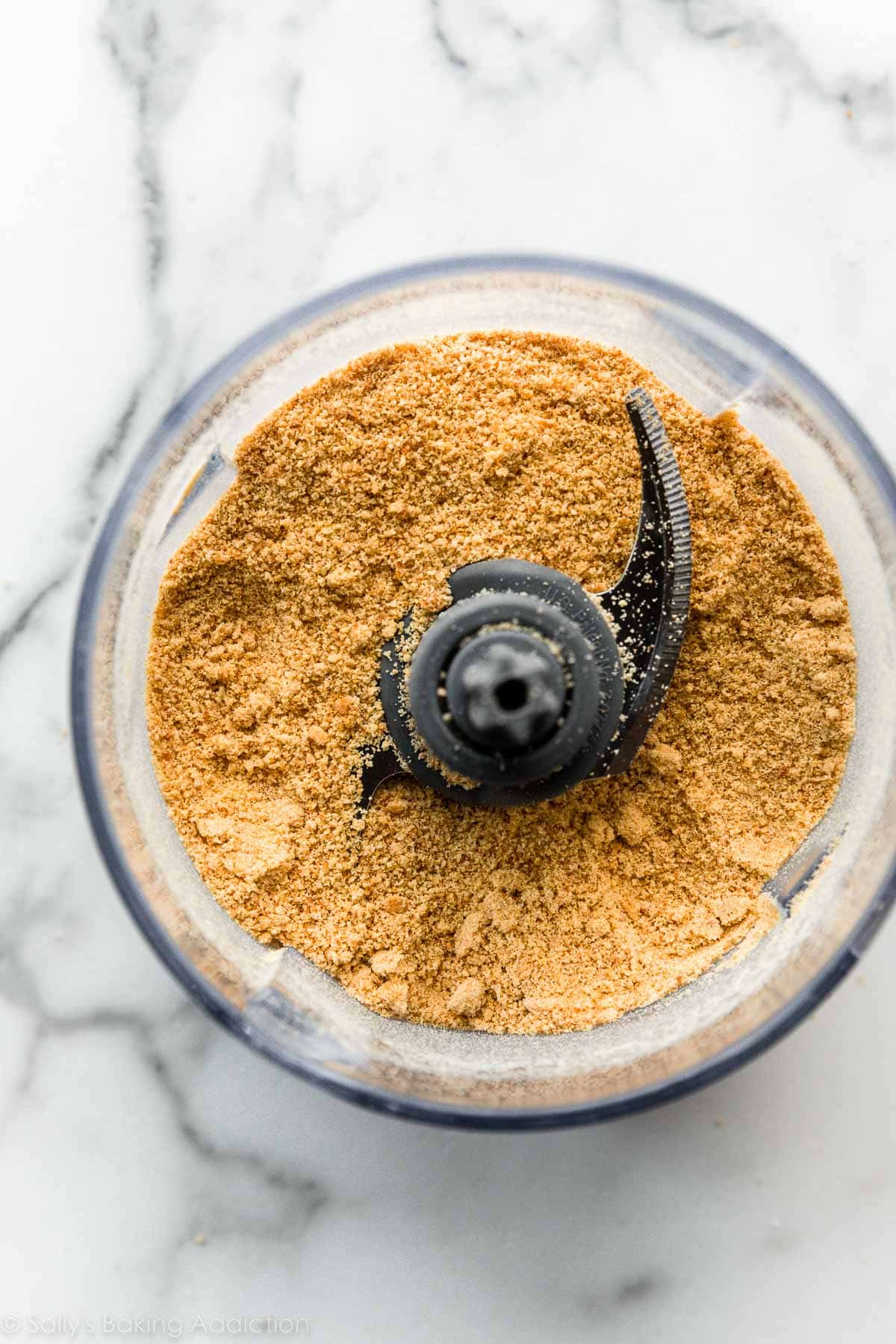 graham cracker crumbs in food processor.