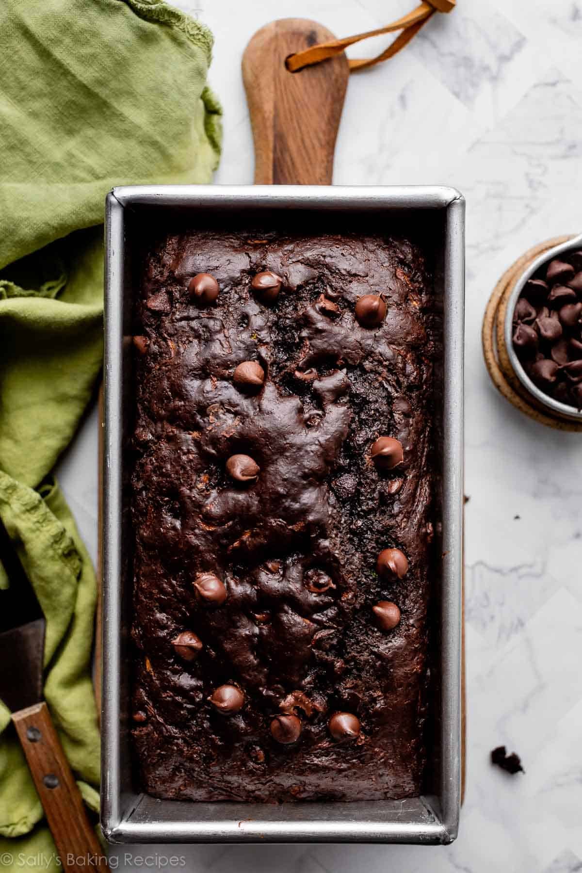 loaf of chocolate zucchini bread in loaf pan.