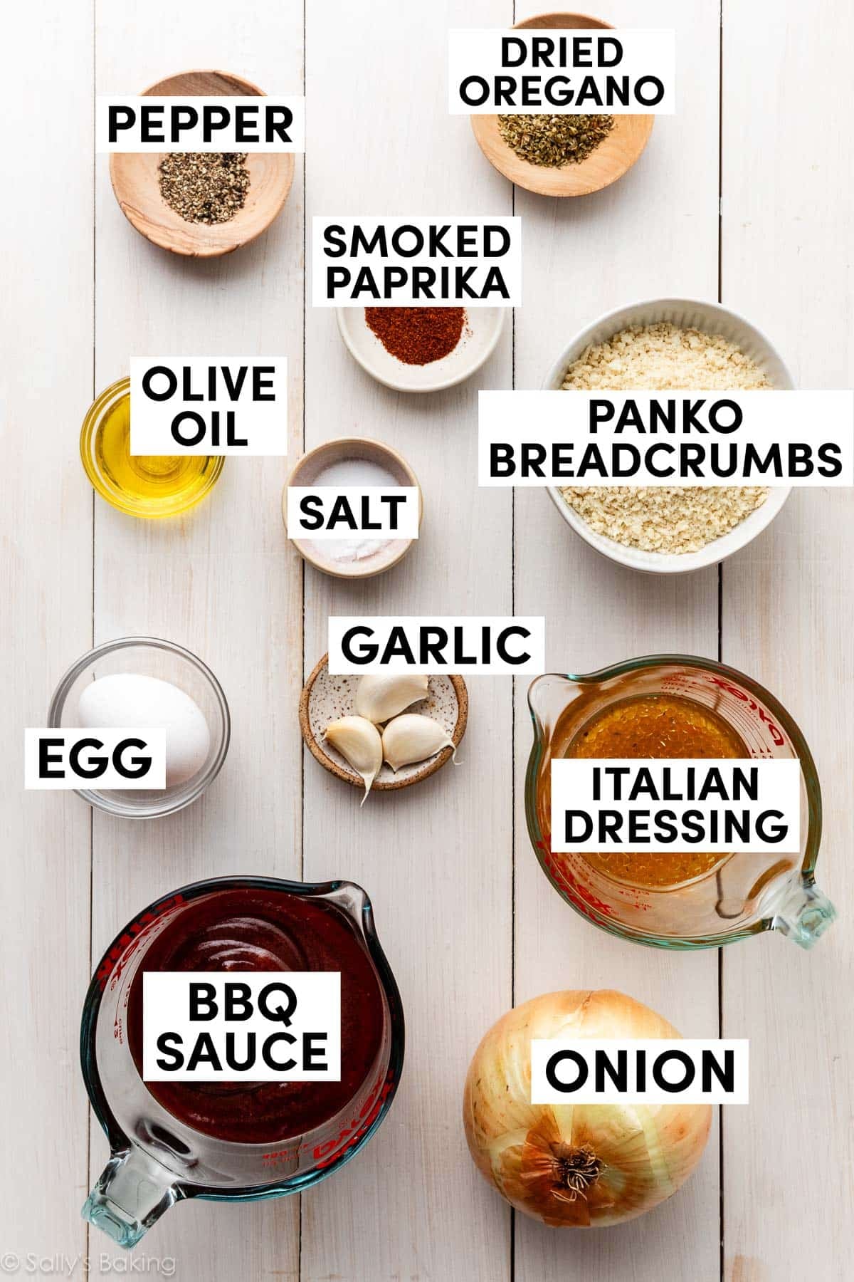 ingredients in bowls including panko breadcrumbs, italian dressing, garlic, egg, and olive oil.