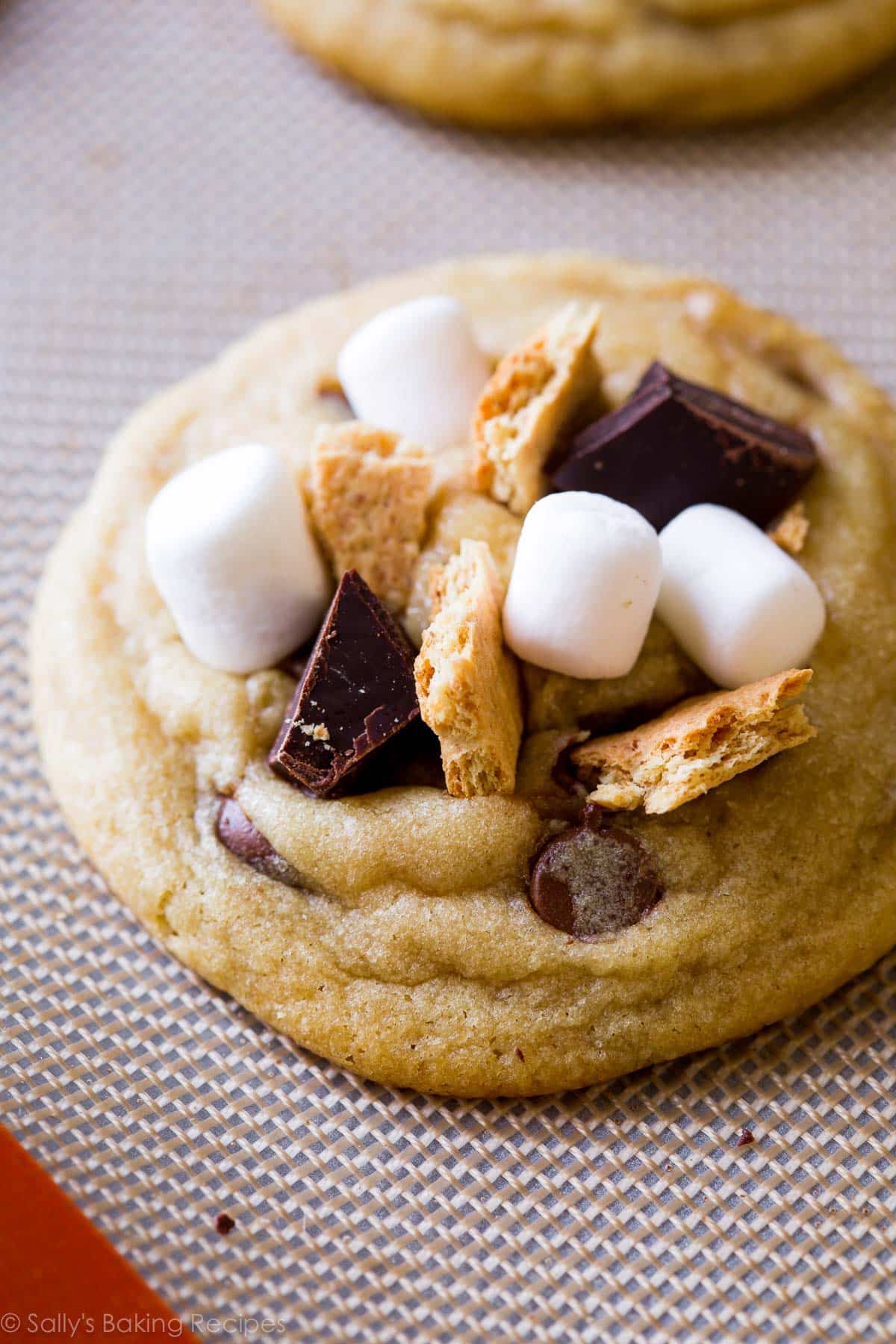 chocolate chip cookie with marshmallows, graham crackers, and chocolate on top.
