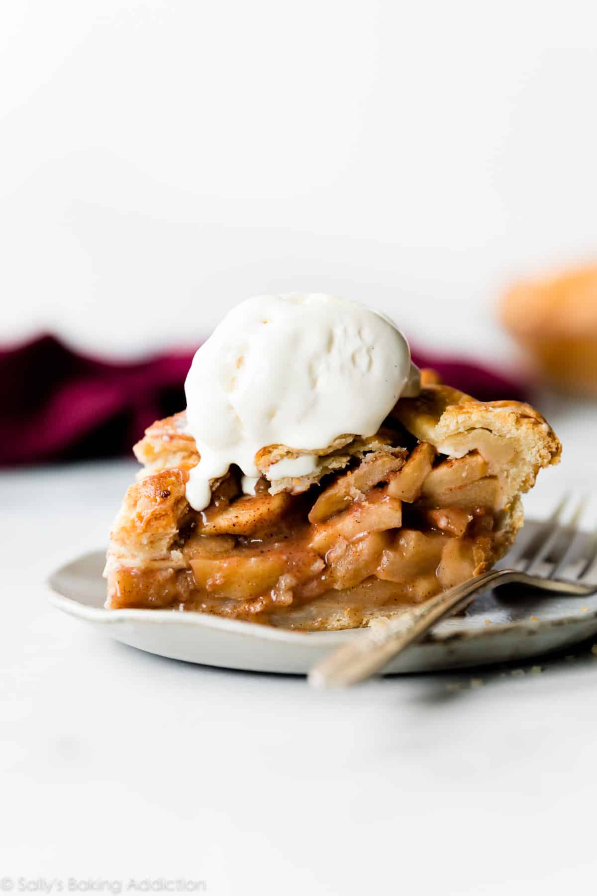 slice of chai spice apple pie on a plate
