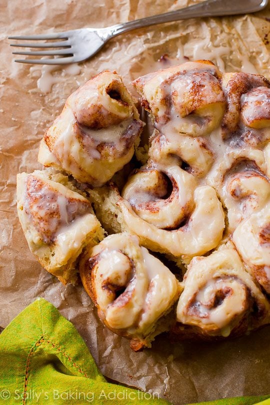 overhead image of cinnamon rolls with maple icing