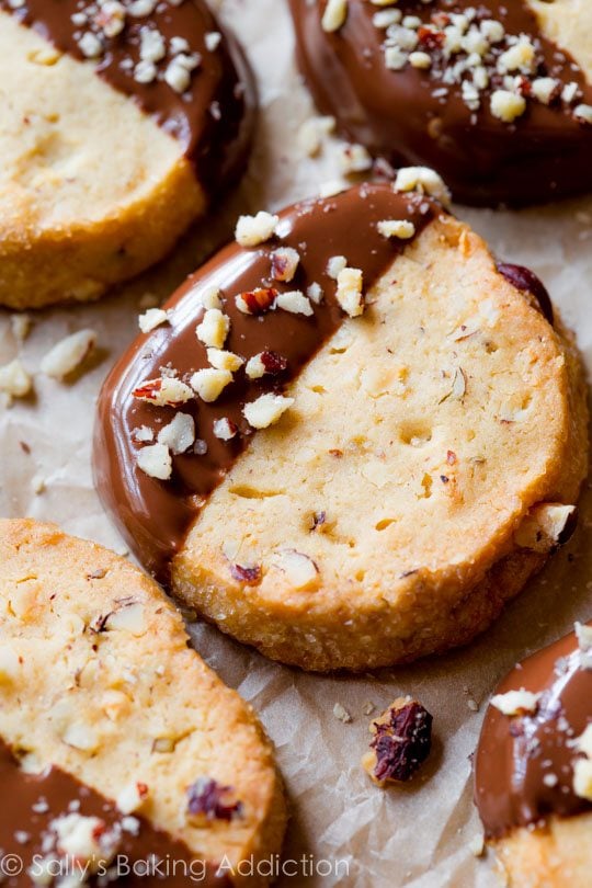 toasted hazelnut slice and bake cookies with half of each cookie dipped in milk chocolate