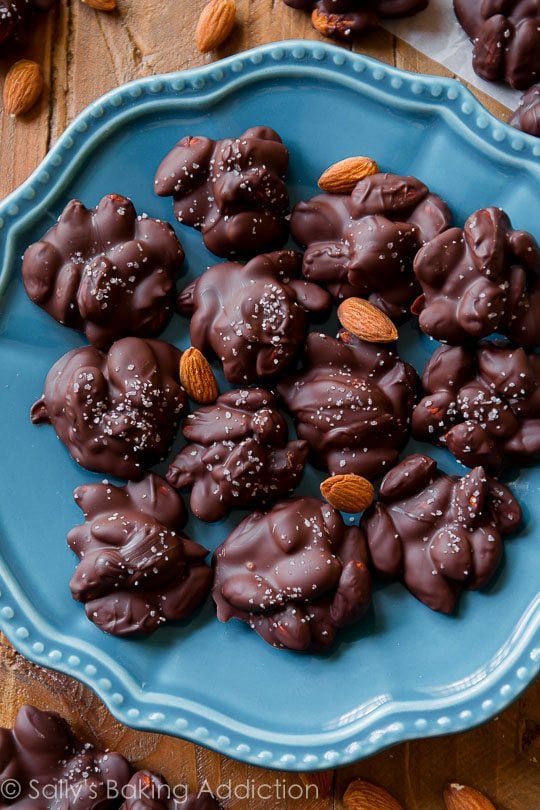 sea salt dark chocolate almond clusters on a blue plate