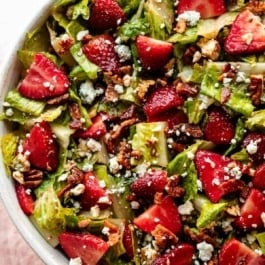 strawberry bacon salad with blue cheese and pecans.