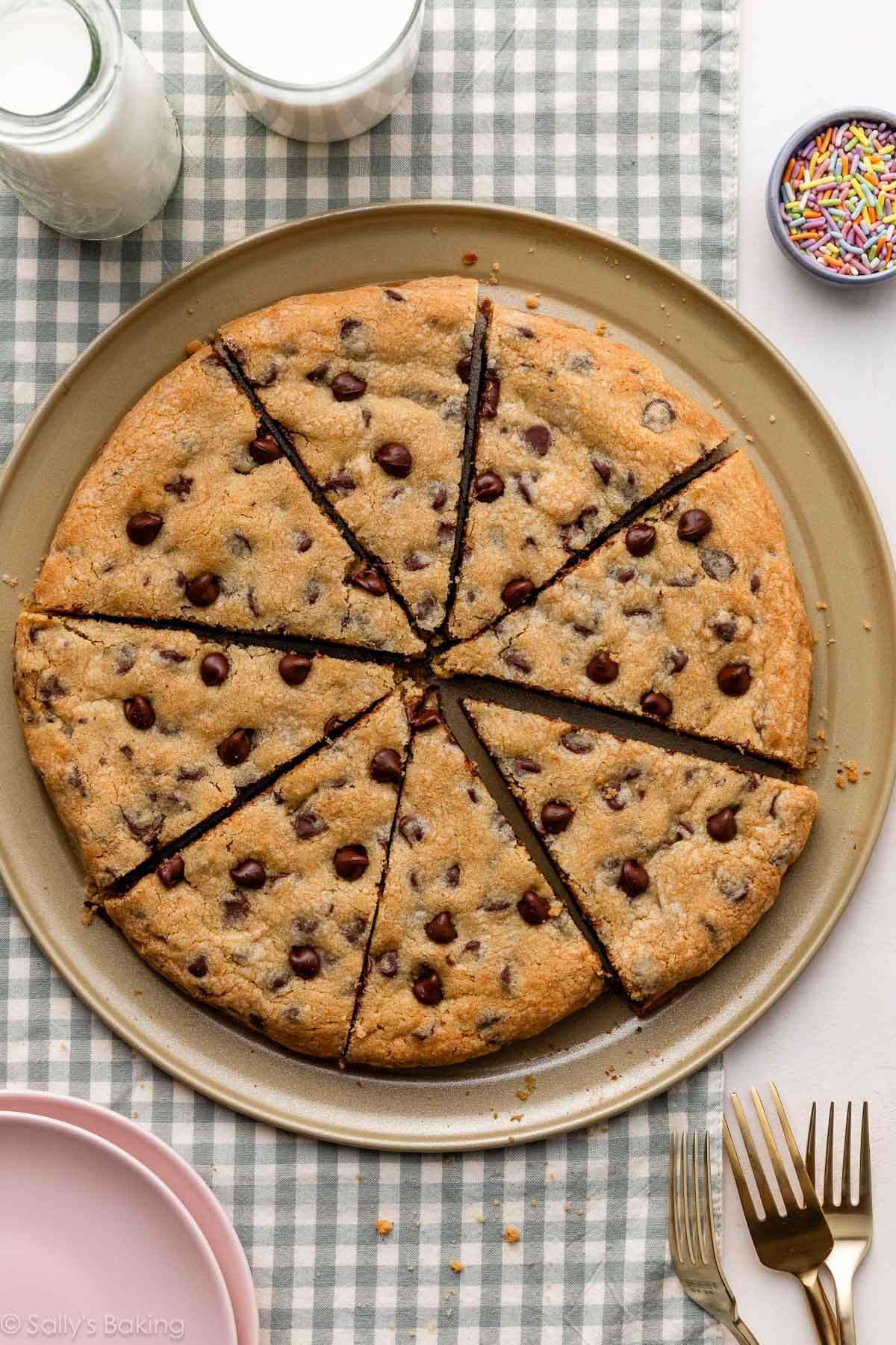 chocolate chip cookie pizza cut into slices.