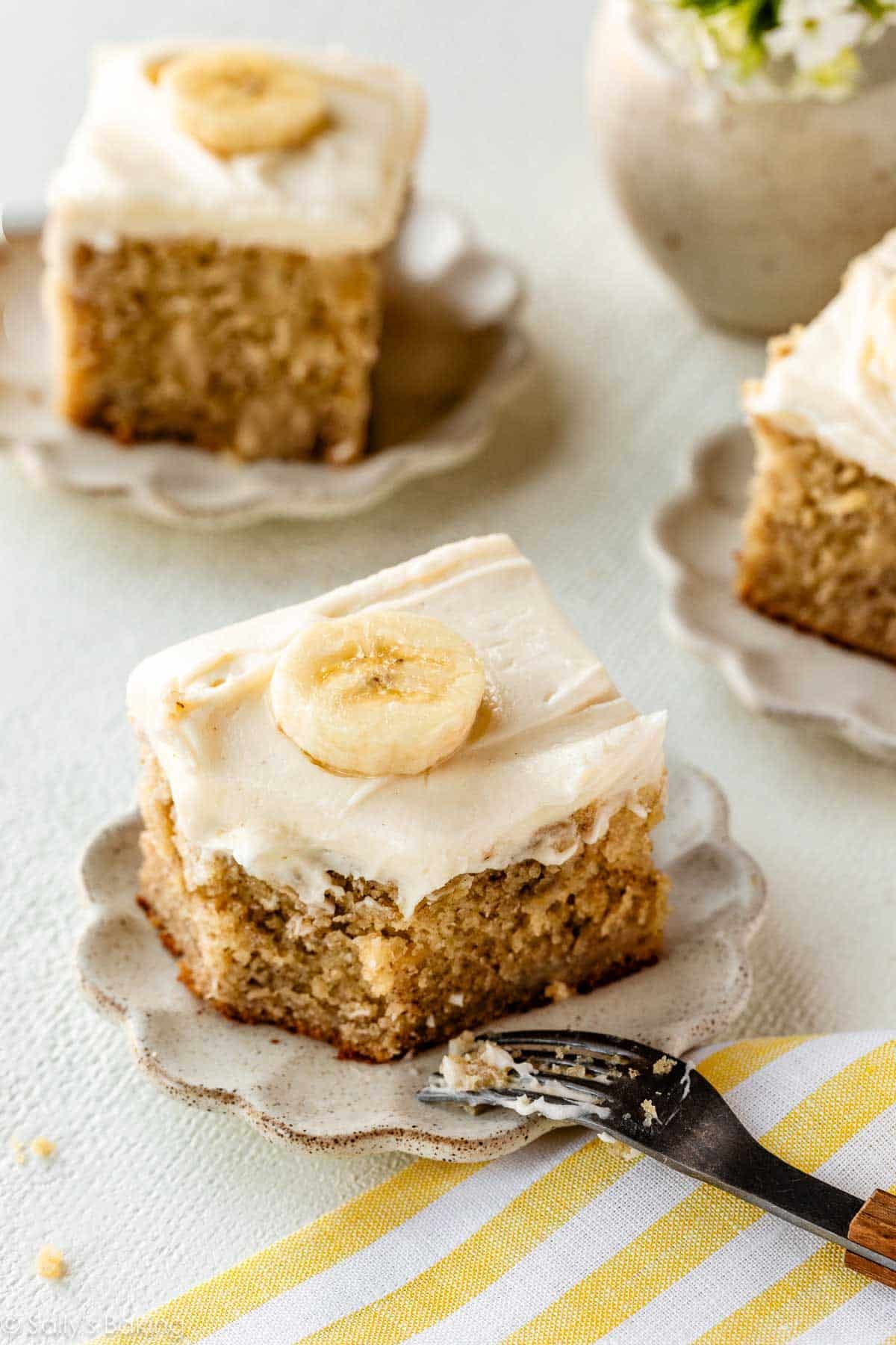banana cake slices on plates.