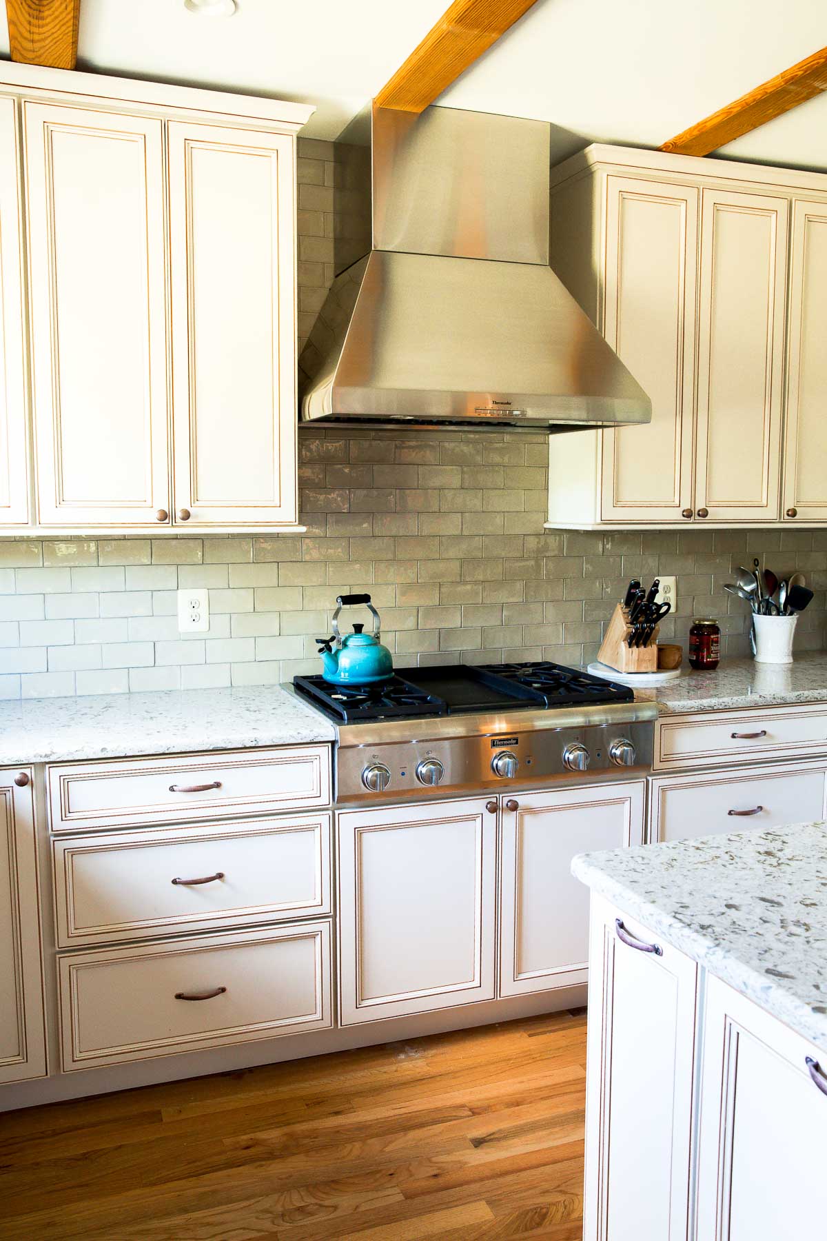 kitchen remodel with range, cabinets, and counters installed