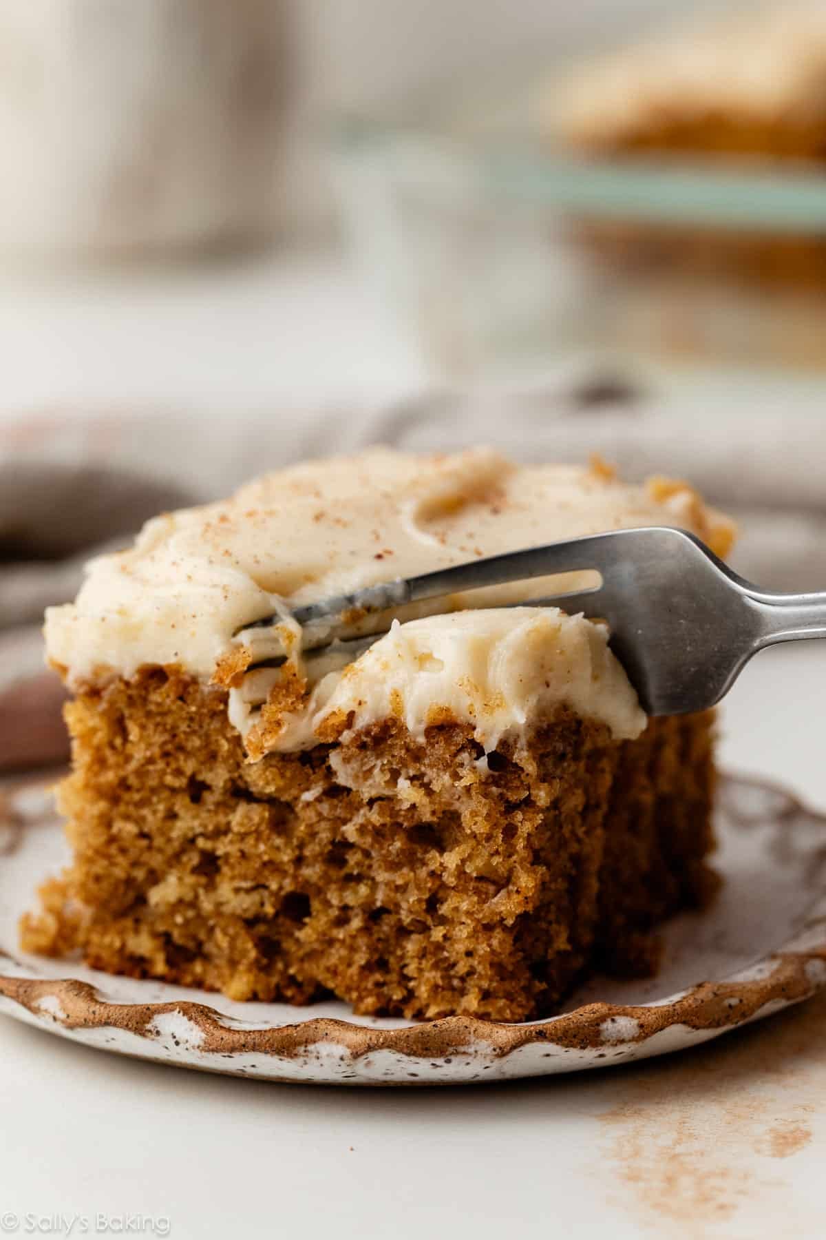 piece of spice cake with brown butter cream cheese frosting.