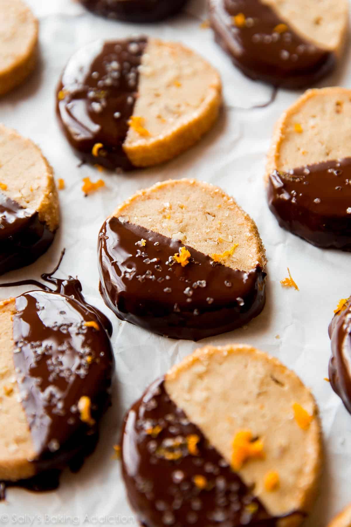 orange slice and bake cookies with half of each cookie dipped in dark chocolate