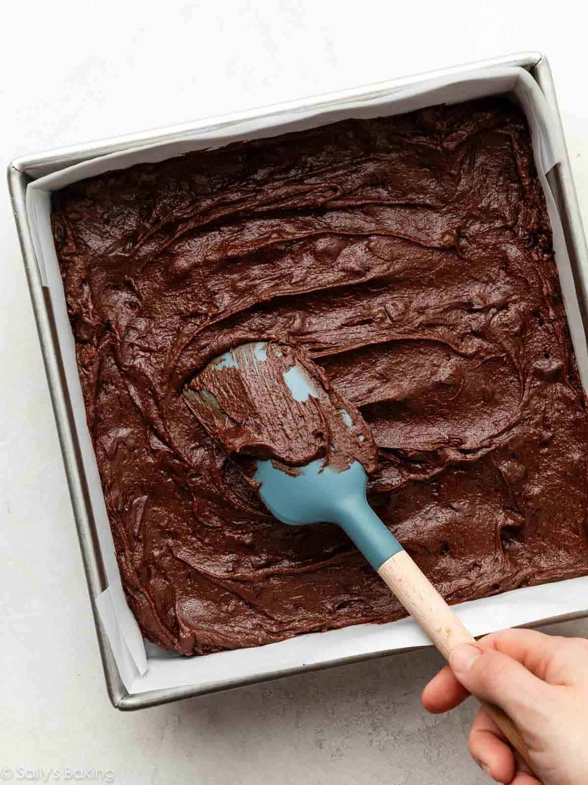 spreading batter into square pan.