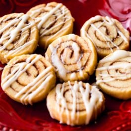 cinnamon roll sugar cookies on a red plate