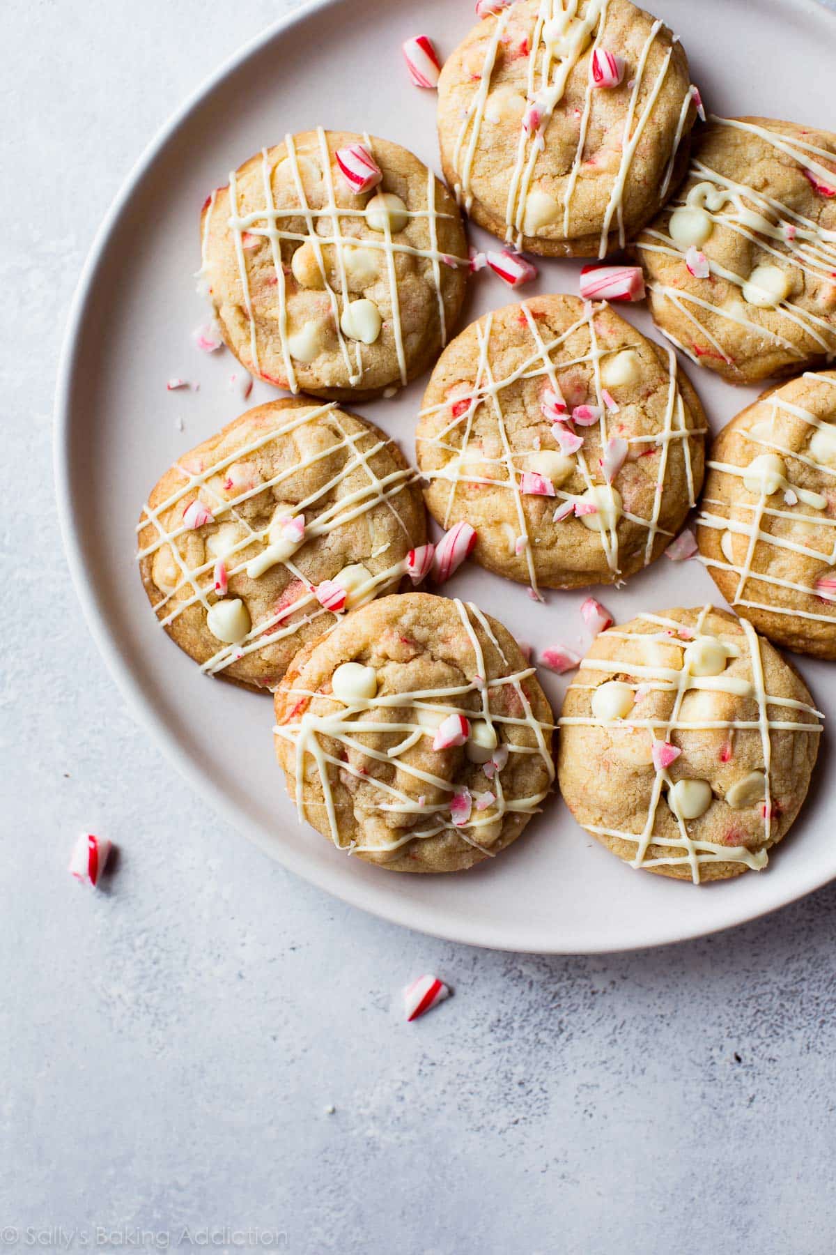 overhead image of peppermint white chocolate cookies on a white plate