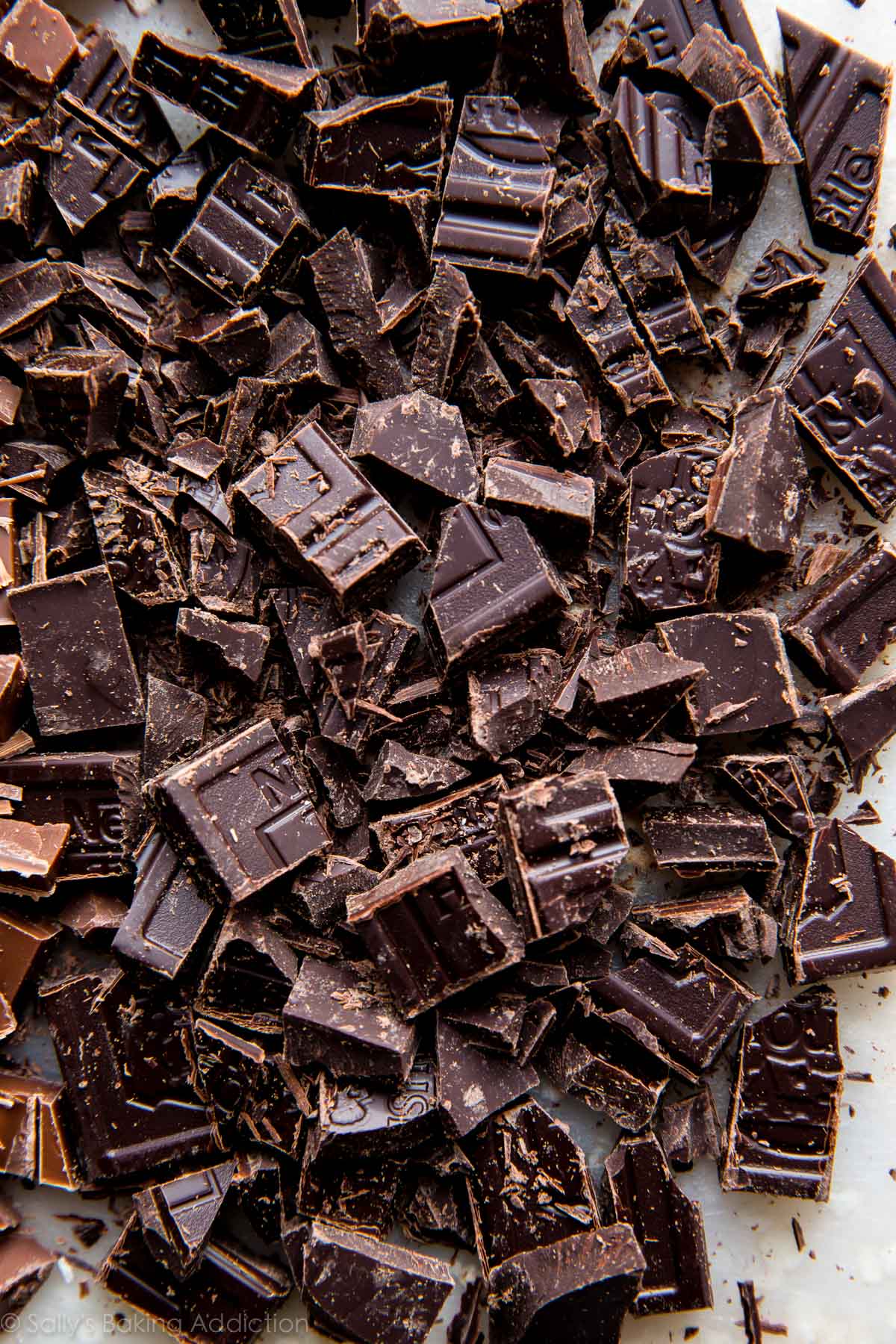 chopped chocolate chunks on cutting board