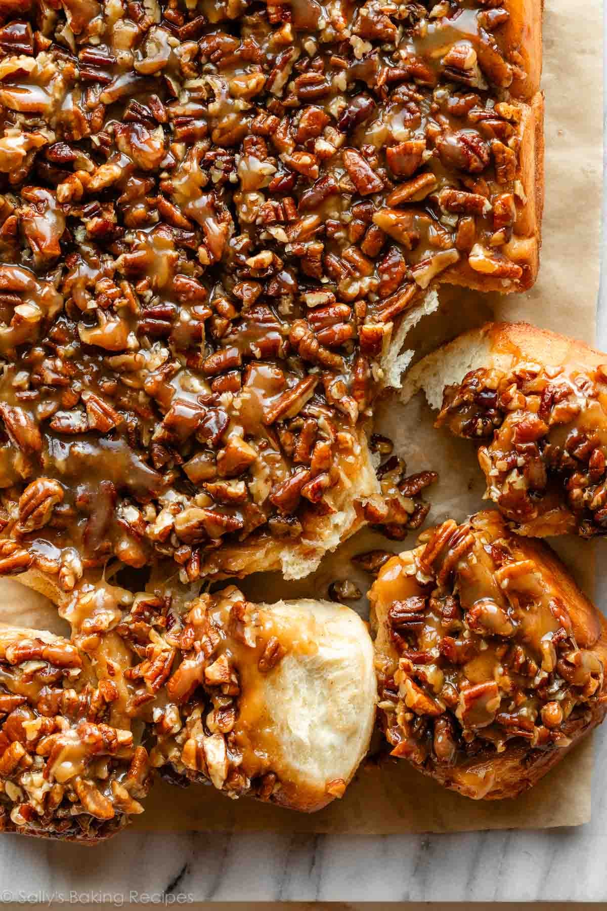 maple pecan sticky buns pulled apart.