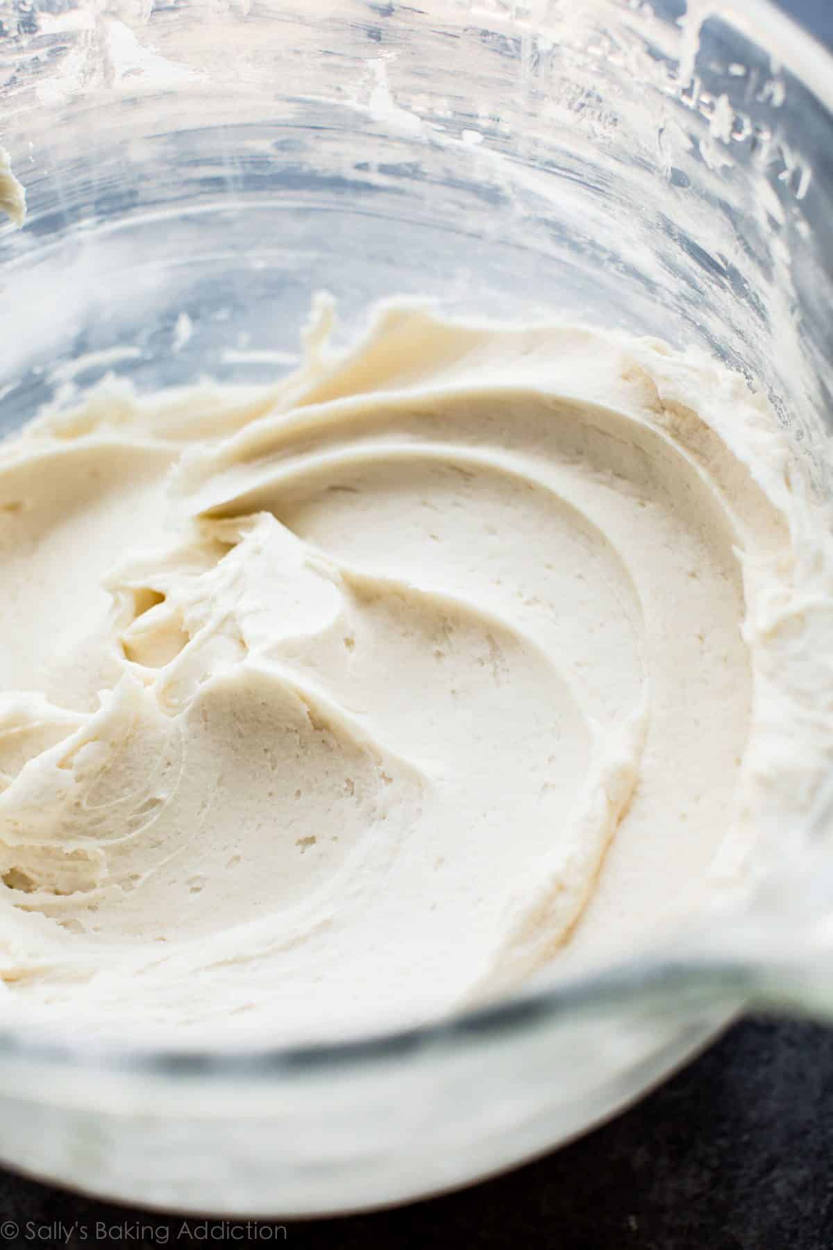 vanilla buttercream frosting in a glass bowl