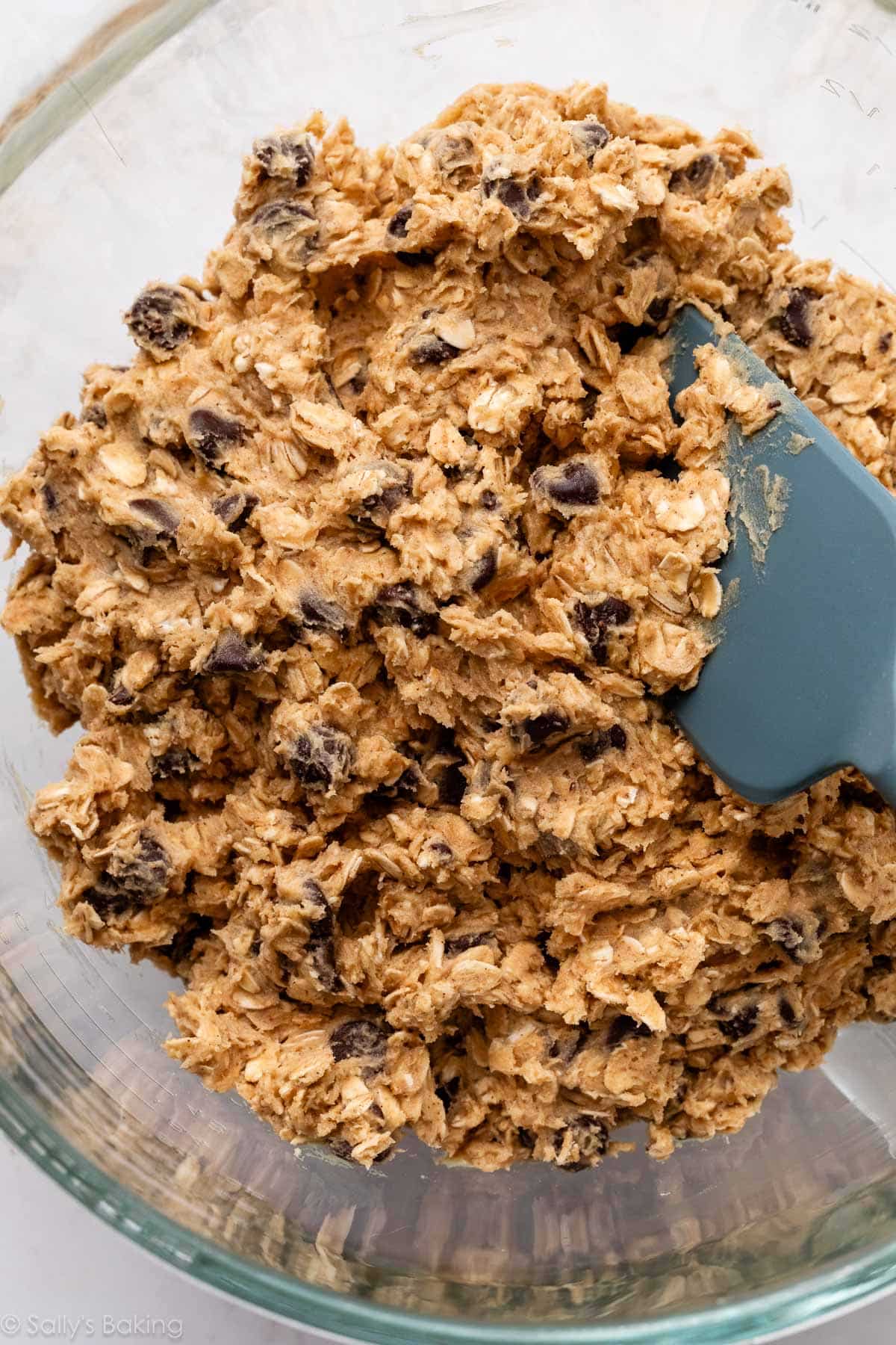 oatmeal chocolate chip cookie dough in glass bowl.