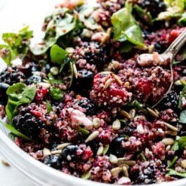 berry quinoa salad in a glass bowl