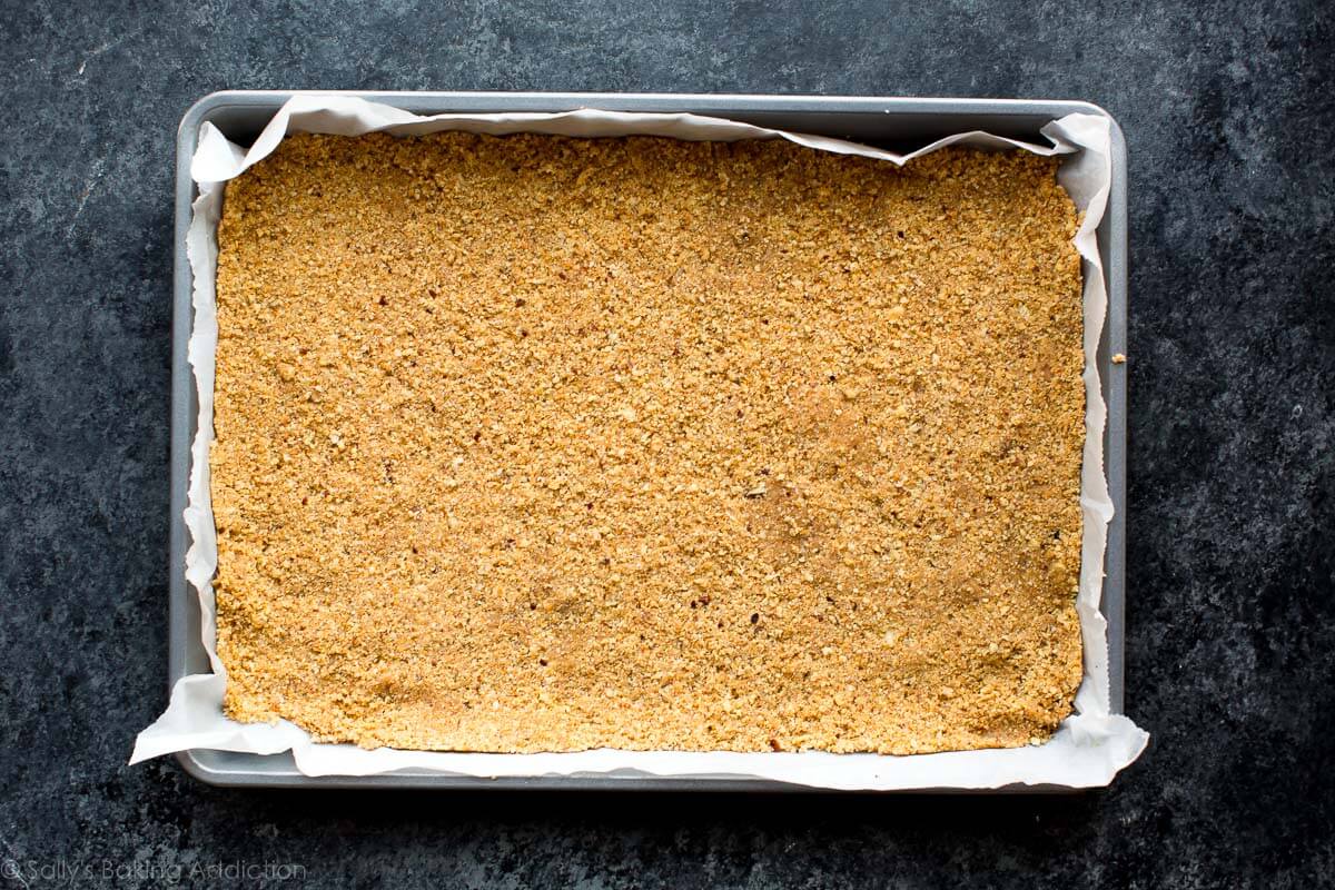 graham cracker crust pressed into bottom of a 9x13 baking dish