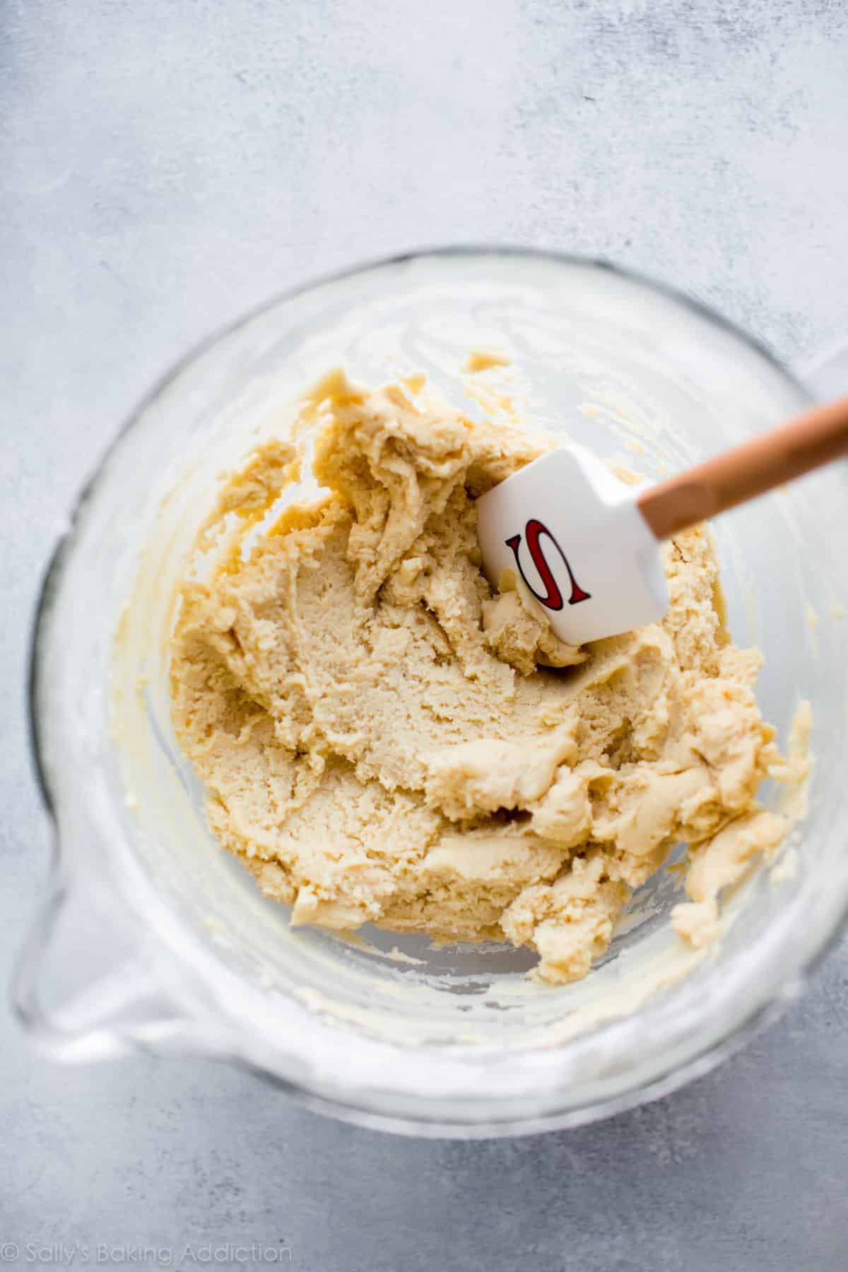 cream cheese sugar cookie dough in a glass bowl