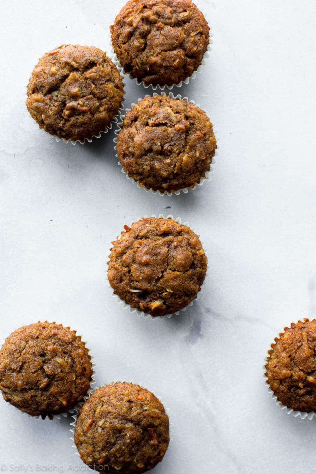 overhead image of carrot cake cupcakes without frosting